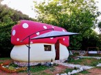 Toadstool house with umbrella